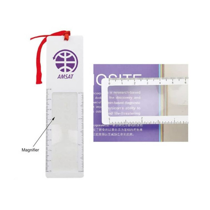 A white magnifying bookmark ruler with a red ribbon, featuring a magnifier and measurement markings.