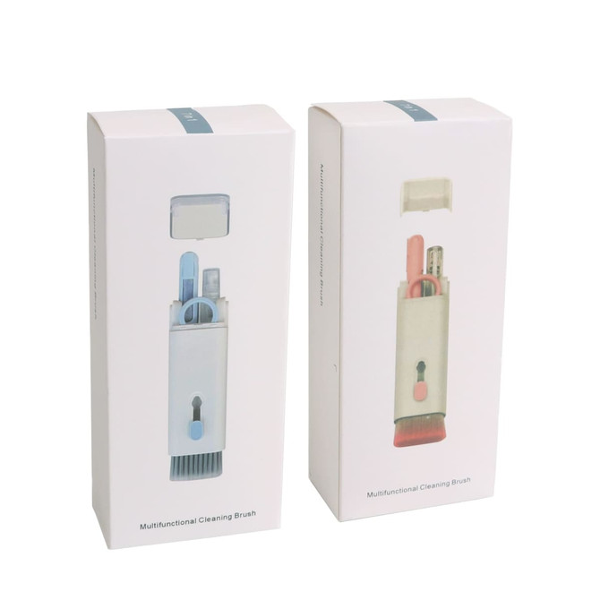 Two boxes of a multifunctional cleaning kit in white with light blue and pink accents, each containing various cleaning tools.