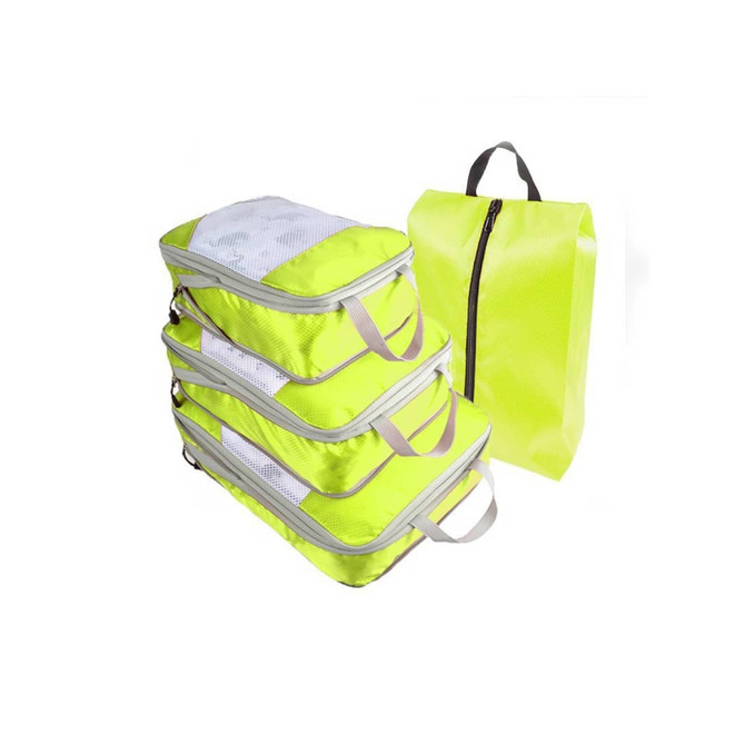 Bright yellow travel packing cubes in various sizes, featuring mesh panels and handles for easy carrying.