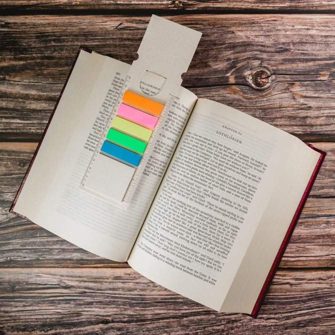 A Rectangle Milk Carton Bookmark features a kraft paper design with colorful sticky tabs for marking pages in a book.