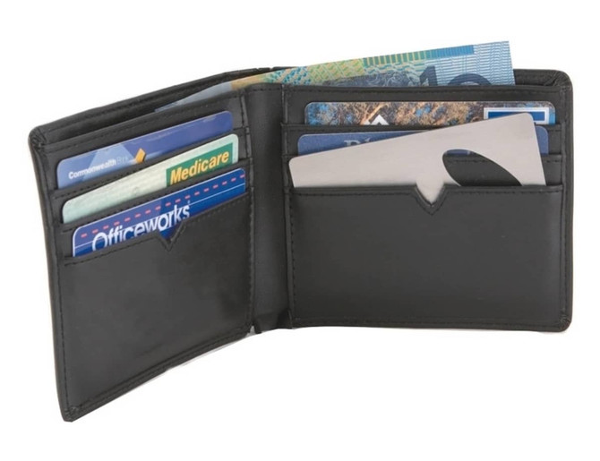 A black wallet opened to display Australian banknotes and multiple card slots, with a sleek silver card visible.