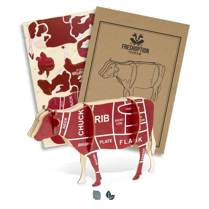 A wooden model of a cow in brown and cream, featuring labelled cuts of meat, with packaging behind it.