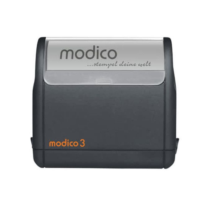 A dark grey stamp with an orange branding detail, featuring a clear top for imprint visibility.