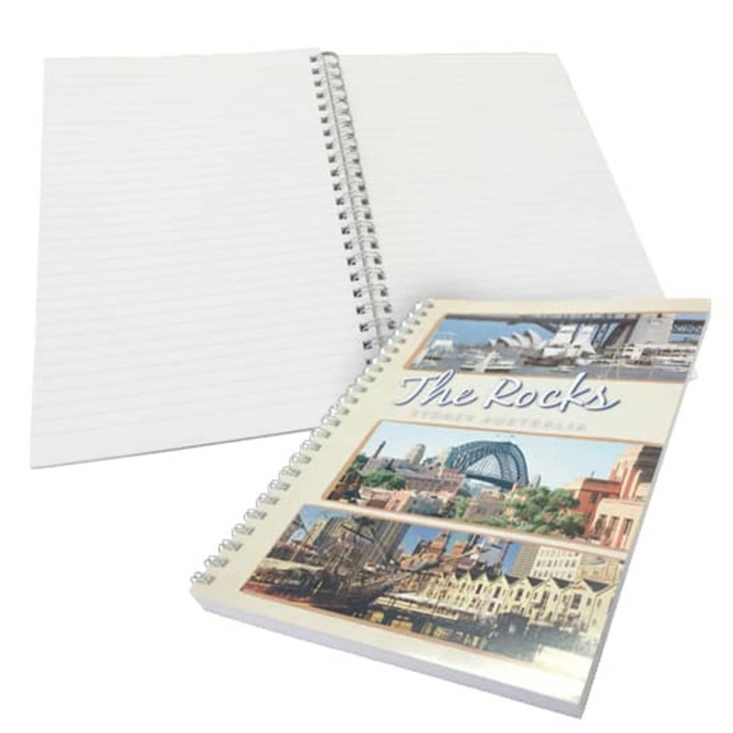 A4 soft cover wiro bound book with a multi-coloured cover and blank lined pages inside.