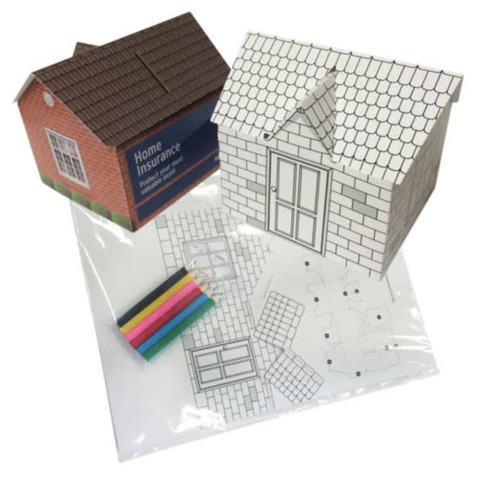 A house-shaped money box kit featuring a printable design, markers in assorted colours, and a self-assembly template.