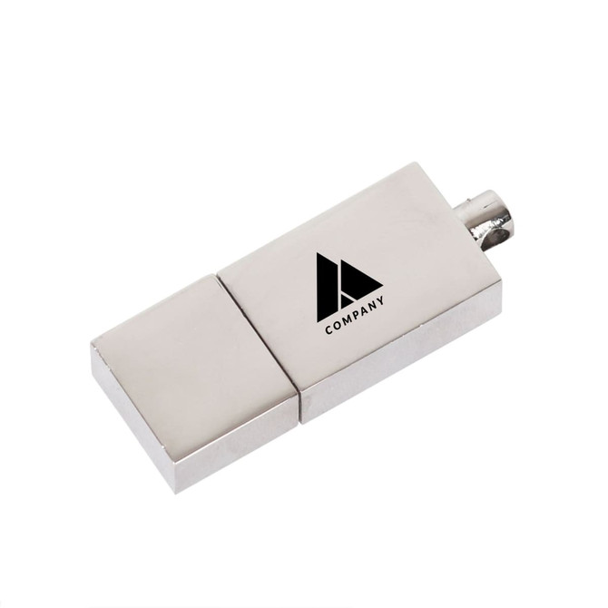 A silver flash drive with a logo displayed on its surface. The design is sleek and compact.