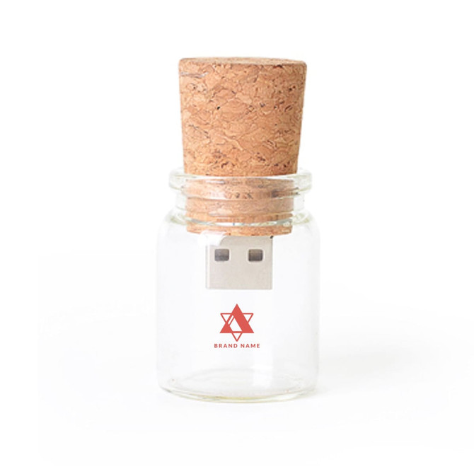 A glass bottle with a cork lid contains a USB flash drive. The bottle has a logo and is clear with a natural cork.