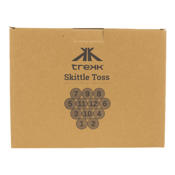 A brown cardboard box containing circular skittle game pieces, featuring a logo and numbers printed on them.