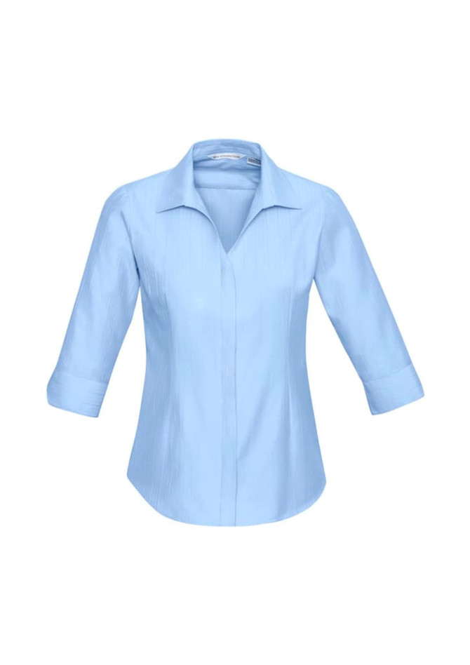 A light blue women's button-up shirt with 3/4 sleeves and a collar. It features a logo on the design.