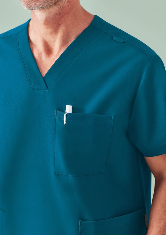 A unisex pulse V-neck scrub top in teal featuring a chest pocket and a logo.