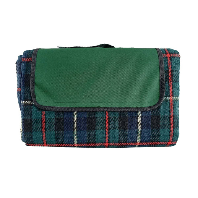 A folded picnic rug featuring a green top and a plaid pattern in blue, red, and cream colours. It has a carrying handle and a logo.