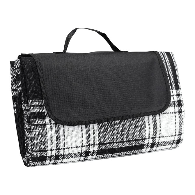 A folded picnic rug in a black and white check pattern with a black handle for easy carrying.