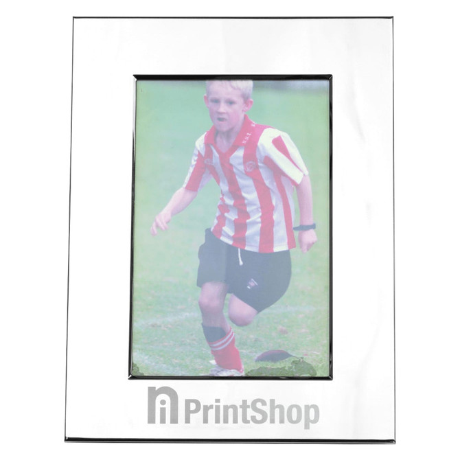 A nickel-plated photo frame with a glossy finish, displaying a photo of a child in a striped jersey.