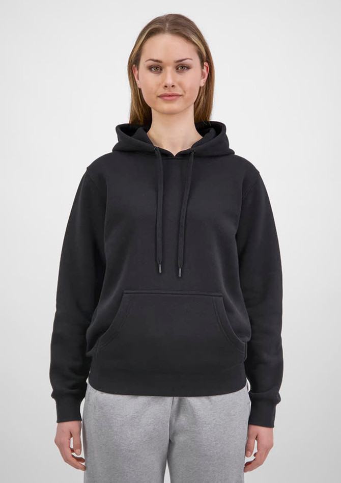 A women's hoodie in black with a drawstring hood and a front pocket, worn with grey pants.