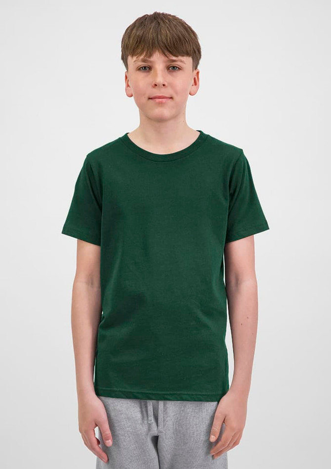 A youth short sleeve tee in dark green, displayed on a model wearing grey shorts. The shirt has a simple design and branding.