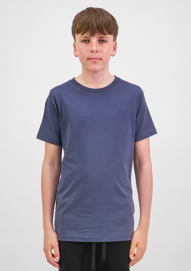 A youth short sleeve tee in navy blue, displayed on a model against a neutral background.