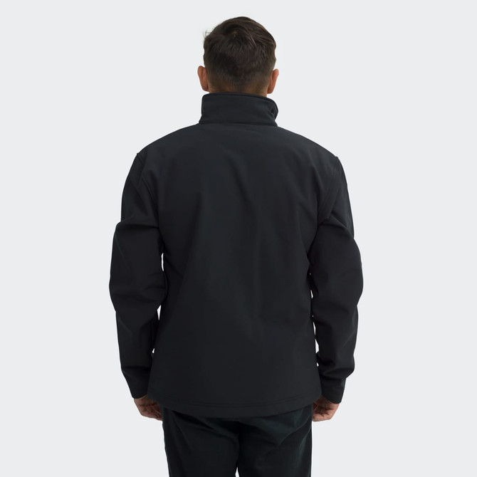 A black unisex soft shell jacket featuring a high collar and a simple design, with a logo on the sleeve.