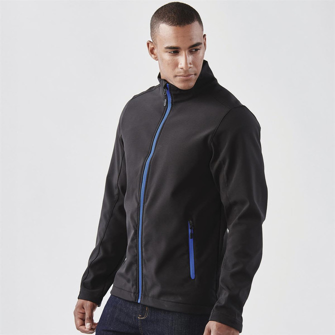 A black softshell jacket with blue zipper accents, featuring a high collar and a fitted design.