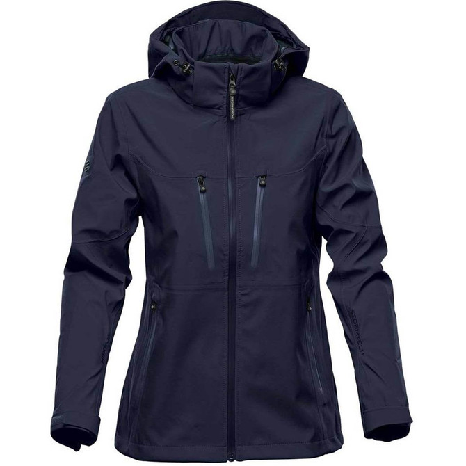 A women's softshell jacket in navy blue with a hood and zippered pockets, featuring a logo on the sleeve.