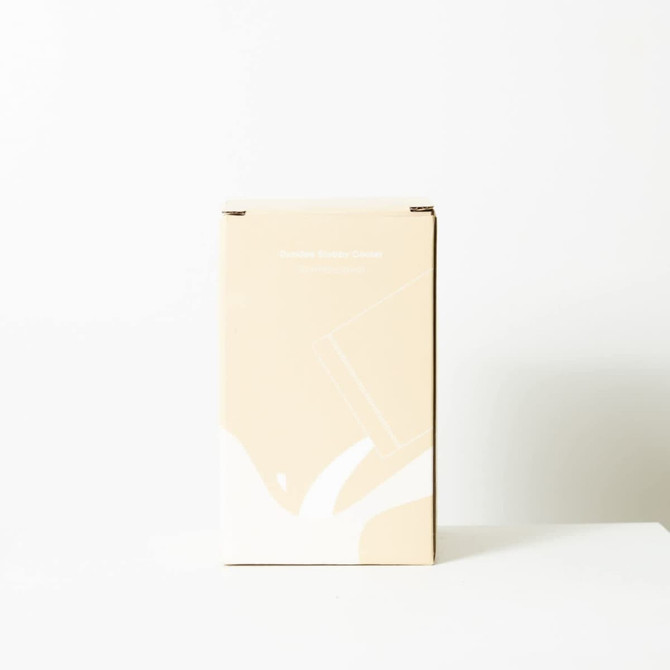 A drink cooler in a light brown box, featuring a simple design and a logo.