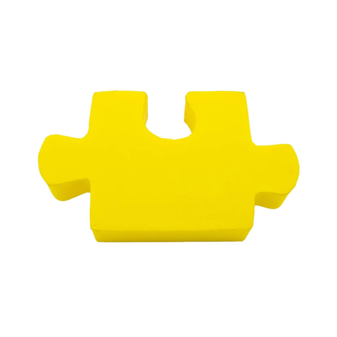 A yellow jigsaw puzzle piece made of soft material, featuring a hole in the middle and rounded edges.