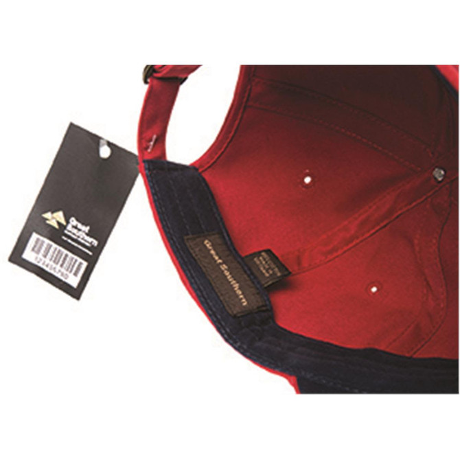 A red and navy cap featuring an inner lining tag and a price tag attached.