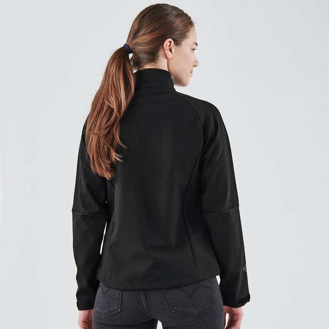 A women's ultra-light shell jacket in black, featuring a sleek design and a logo on the sleeve.