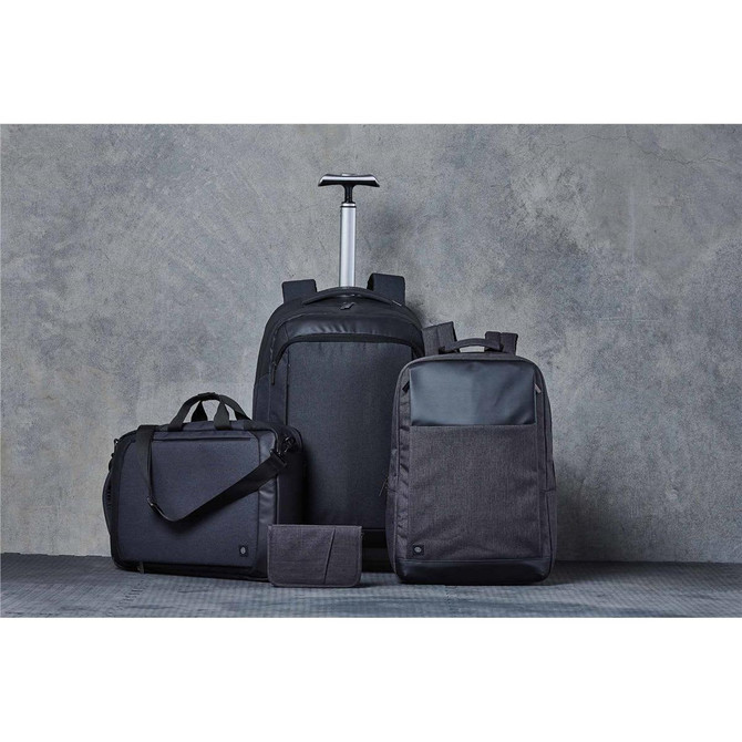A set of black and dark grey bags, including a roller bag, laptop bag, and a small accessory pouch, featuring branding.
