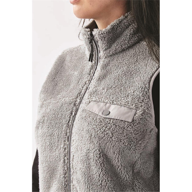 A women's grey Sherpa fleece vest with a zip front and a small pocket, featuring a logo on the chest.