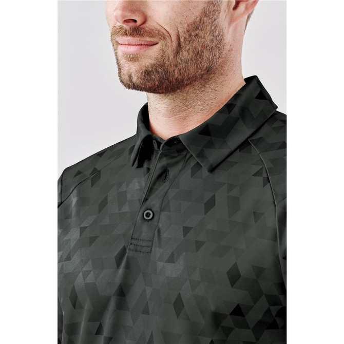 A men's polo shirt in a dark green geometric pattern, featuring a collar and buttons, with a logo on the chest.