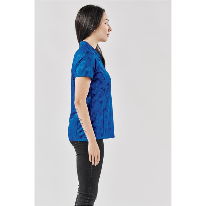 A side view of a blue patterned women's polo shirt with a collar, featuring a logo on the chest.