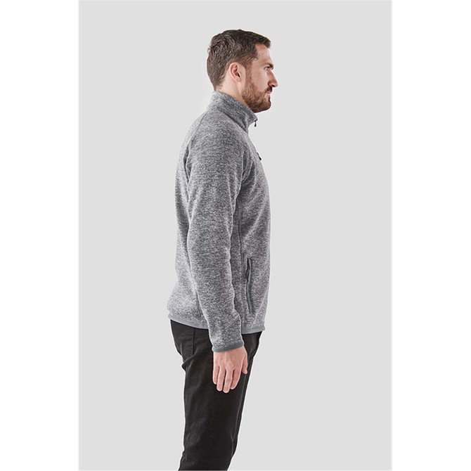 A men's full zip fleece jacket in grey, featuring a zippered pocket and a logo on the chest.
