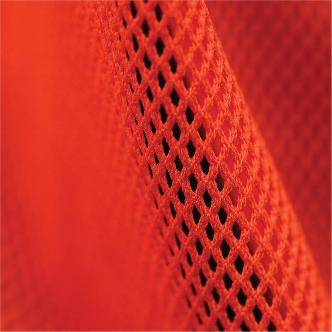 A close-up of textured orange fabric, featuring a fine, mesh pattern. The material has a soft, breathable quality.