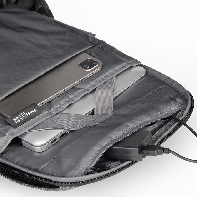 A grey backpack interior with compartments for a laptop and a smartphone, featuring a charging port.
