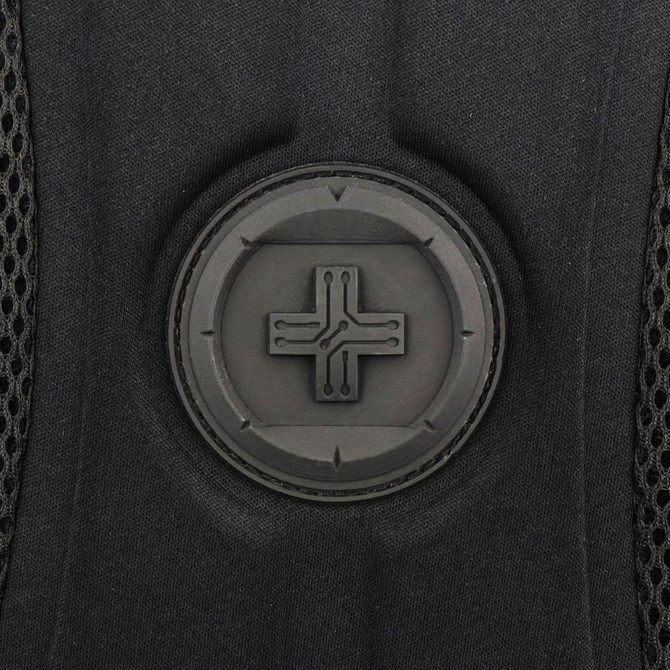 A close-up of a black backpack featuring a round logo with a minimalist design.