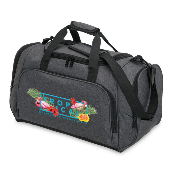 A grey duffle bag with a graphic design featuring tropical elements and a logo. It has dual handles and a shoulder strap.