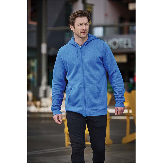 A full zip hooded fleece in blue, featuring a front pocket and a hood, worn by a man in an urban setting.