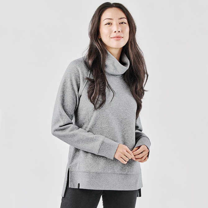 A grey women's cowl neck pullover features a relaxed fit and side slits, accompanied by a subtle logo.
