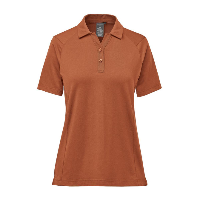 A women's polo shirt in a warm brown colour, featuring a collar and short sleeves. The shirt has a logo.