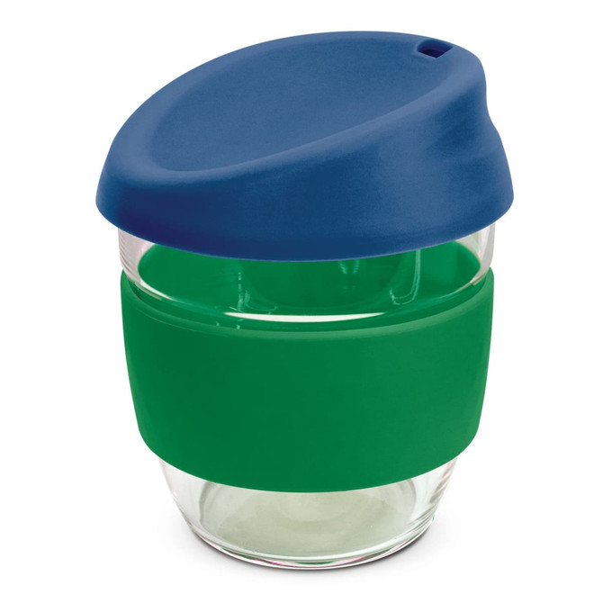 A drink bottle made of borosilicate glass with a blue lid and a green silicone sleeve. It has a logo.