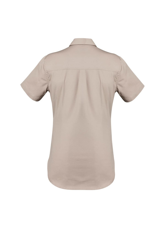 A short sleeve women's work shirt in a light beige colour, featuring a back yoke and a brand logo.