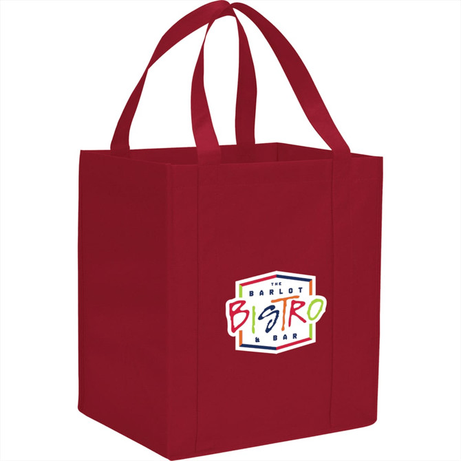 A red non-woven grocery tote bag with two handles and a logo on one side.