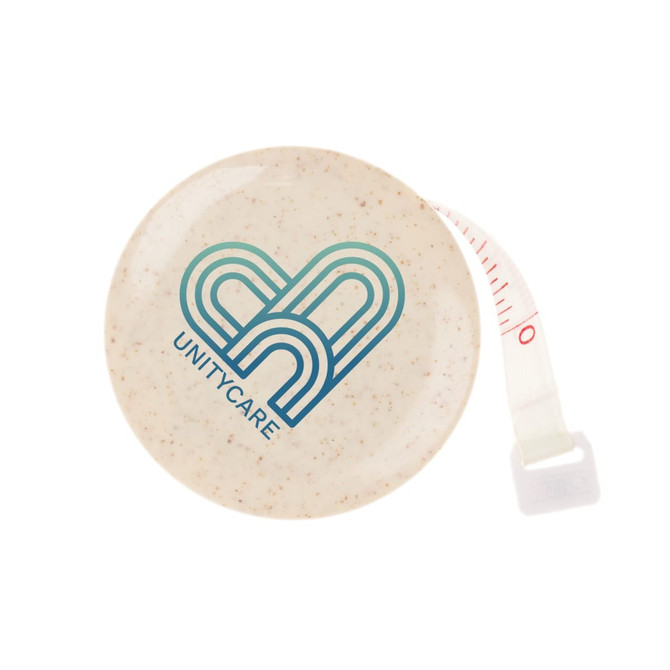 A round, beige tape measure with a retractable mechanism and a logo in blue and green.