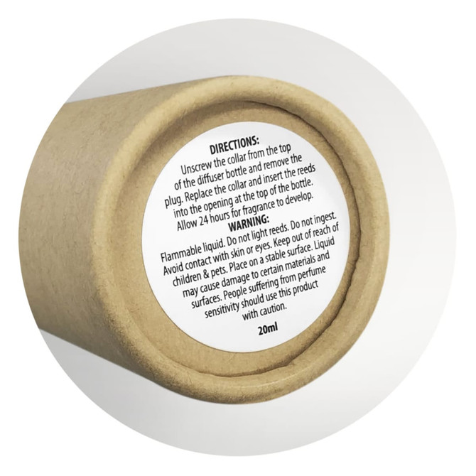 A cylindrical container for a scented diffuser, featuring a natural brown colour, with a warning label.