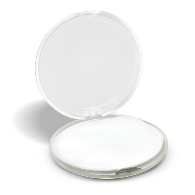 A round, transparent hand soap travel case, featuring a white soap disc inside.