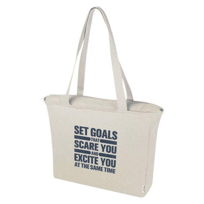 A grey tote bag with a zip closure, featuring a logo and motivational text on the front.