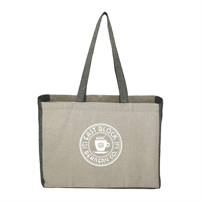 A recycled cotton tote bag in grey with a contrasting darker side and an embossed logo.