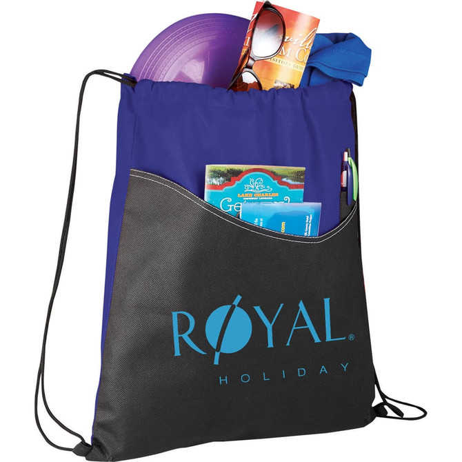 A purple and black drawstring sportspack contains a frisbee, sunglasses, a towel, and brochures, featuring a logo.
