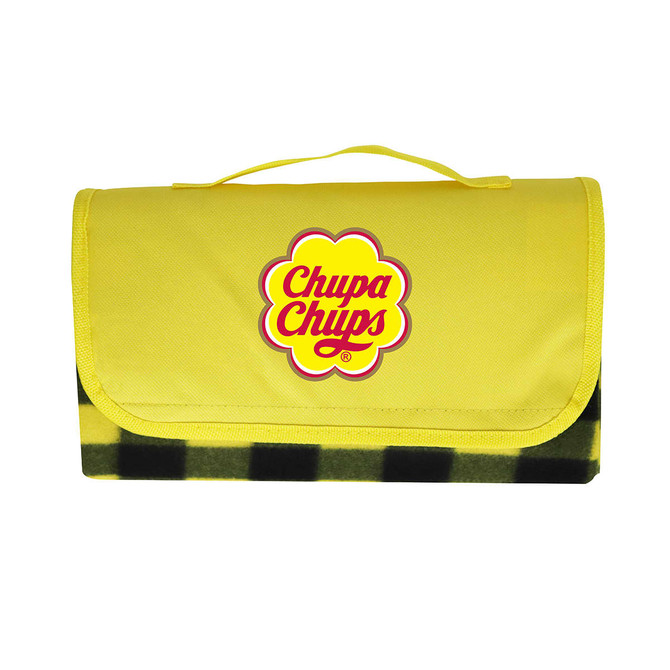 A yellow picnic blanket with a checkered black pattern, featuring a logo on the front.