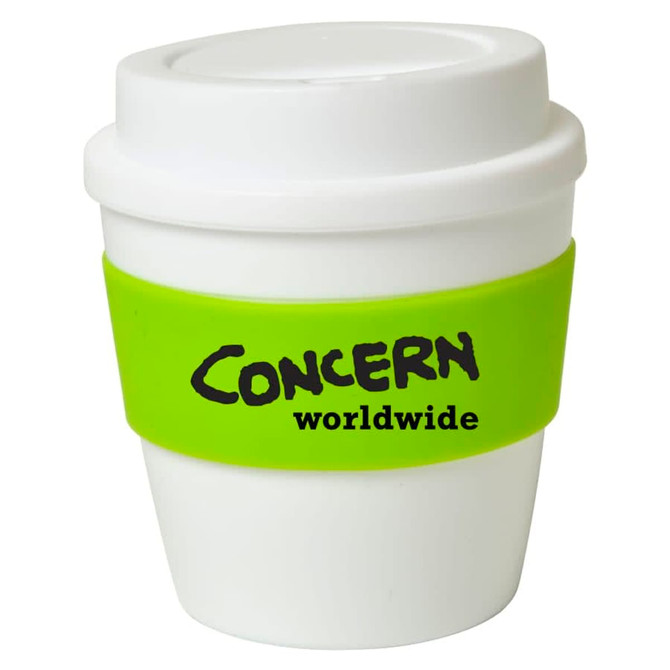 A small white cup with a green silicone band, featuring a logo on the band.
